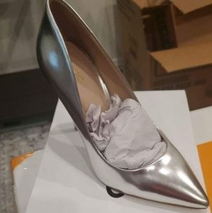 ALDO Silver Pumps